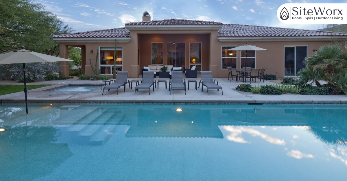 large-pool-in-front-of-house large pool in front of a house