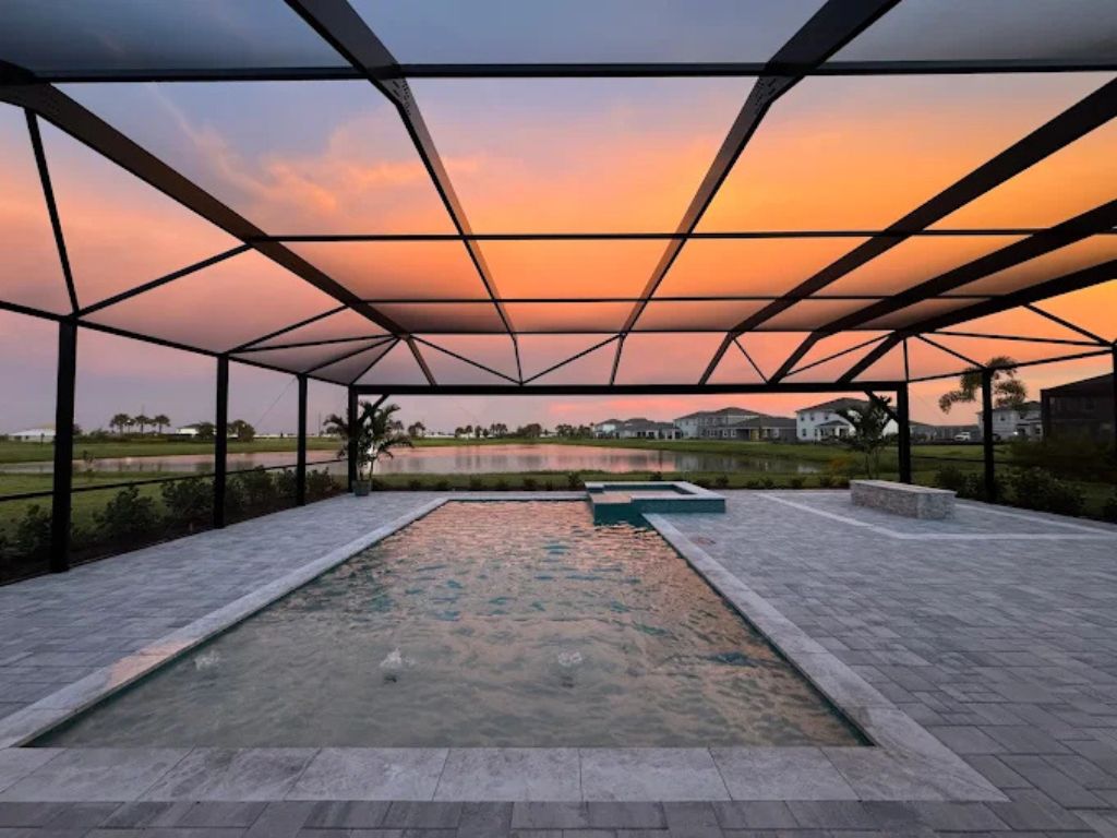 Screened pool at sunset